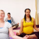 pregnant women in yoga meditiation class