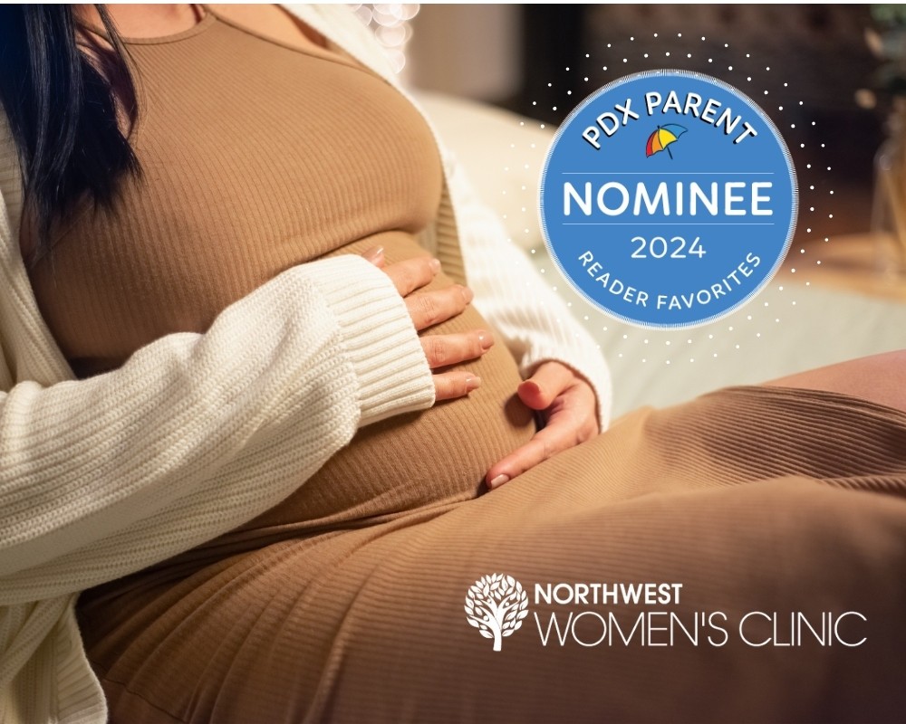 A pregnant woman is pictured with a circular blue seal and the words PDX Parent 2024 Reader Favorites Nominee