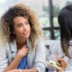 women discussing PMOS