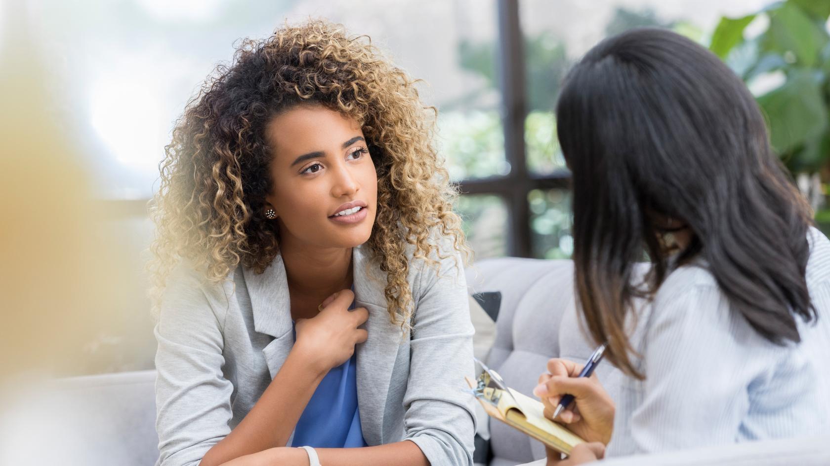 women discussing PMOS